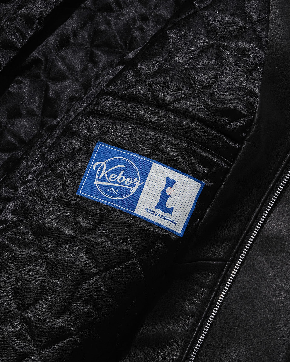 DAC STUDS LEATHER VARSITY JACKET