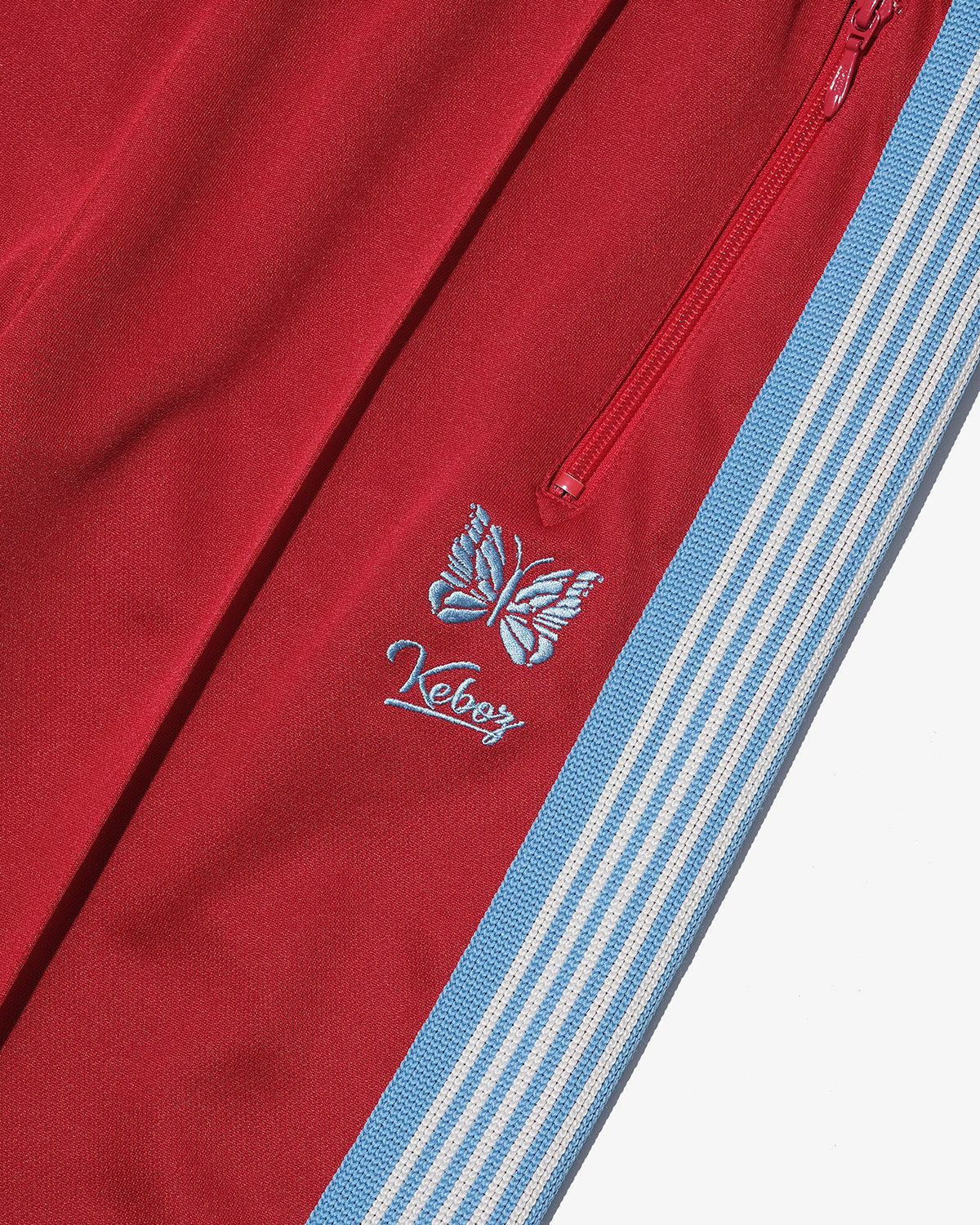 NEEDLES × KEBOZ TRACK PANTS REGULAR FIT