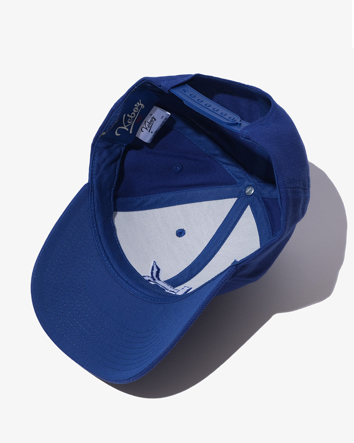 MKT CURVED VISOR SNAPBACK CAP